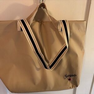 Champion Tan Duffel Tote with Striped Shoulder Handles